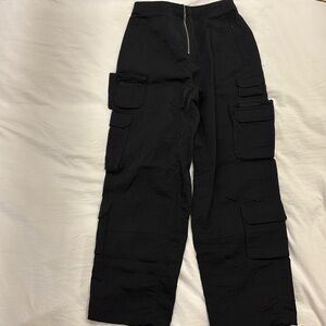 KITH nylon cargo track pants.